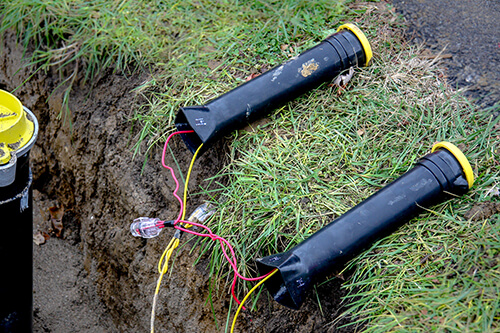 SnakePit products attaching yellow tracer wire using SnakeBite locking connectors