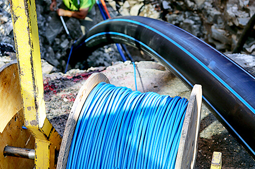 Blue tracer wire used in installing water and sewer pipe