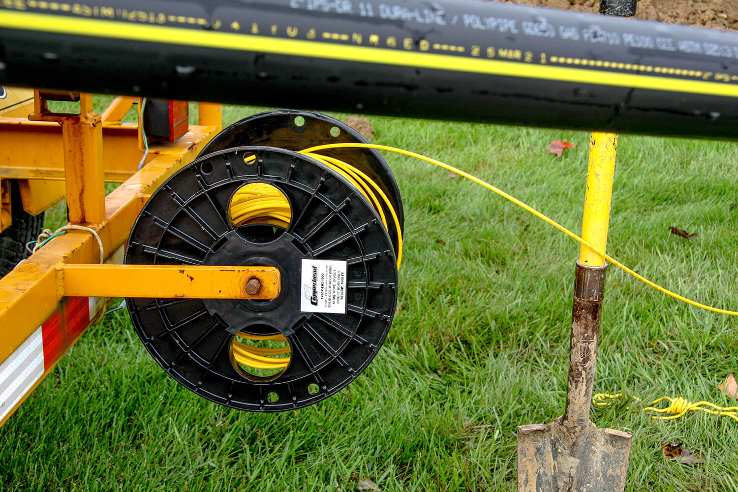 SoloShot Extra-High Strength Tracer Wire in yellow on a spool