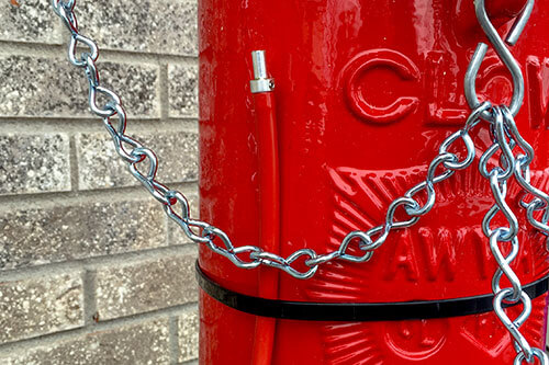 Red snakeskin access point attached to fire hydrant